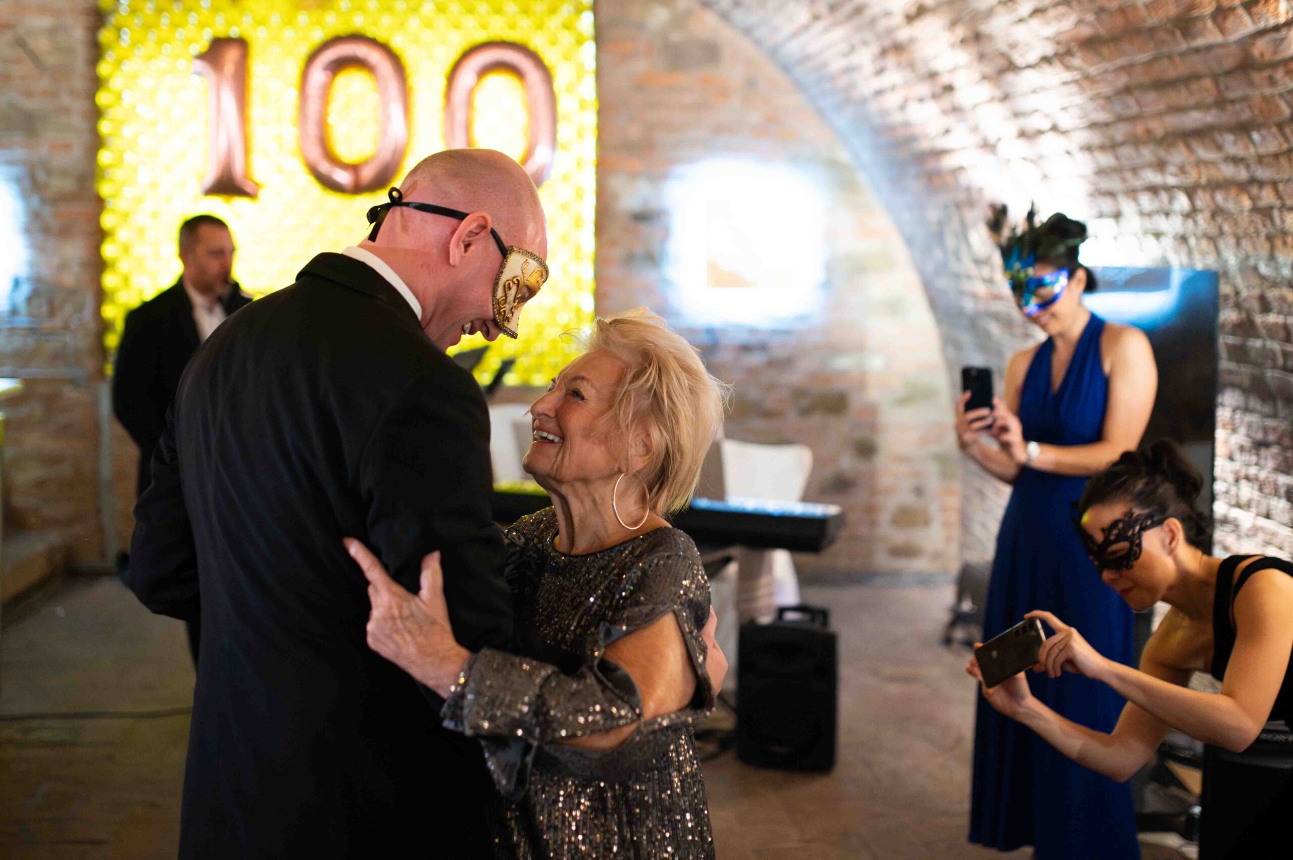 Grandmother dancing at 100th birthday party celebration in Vienna