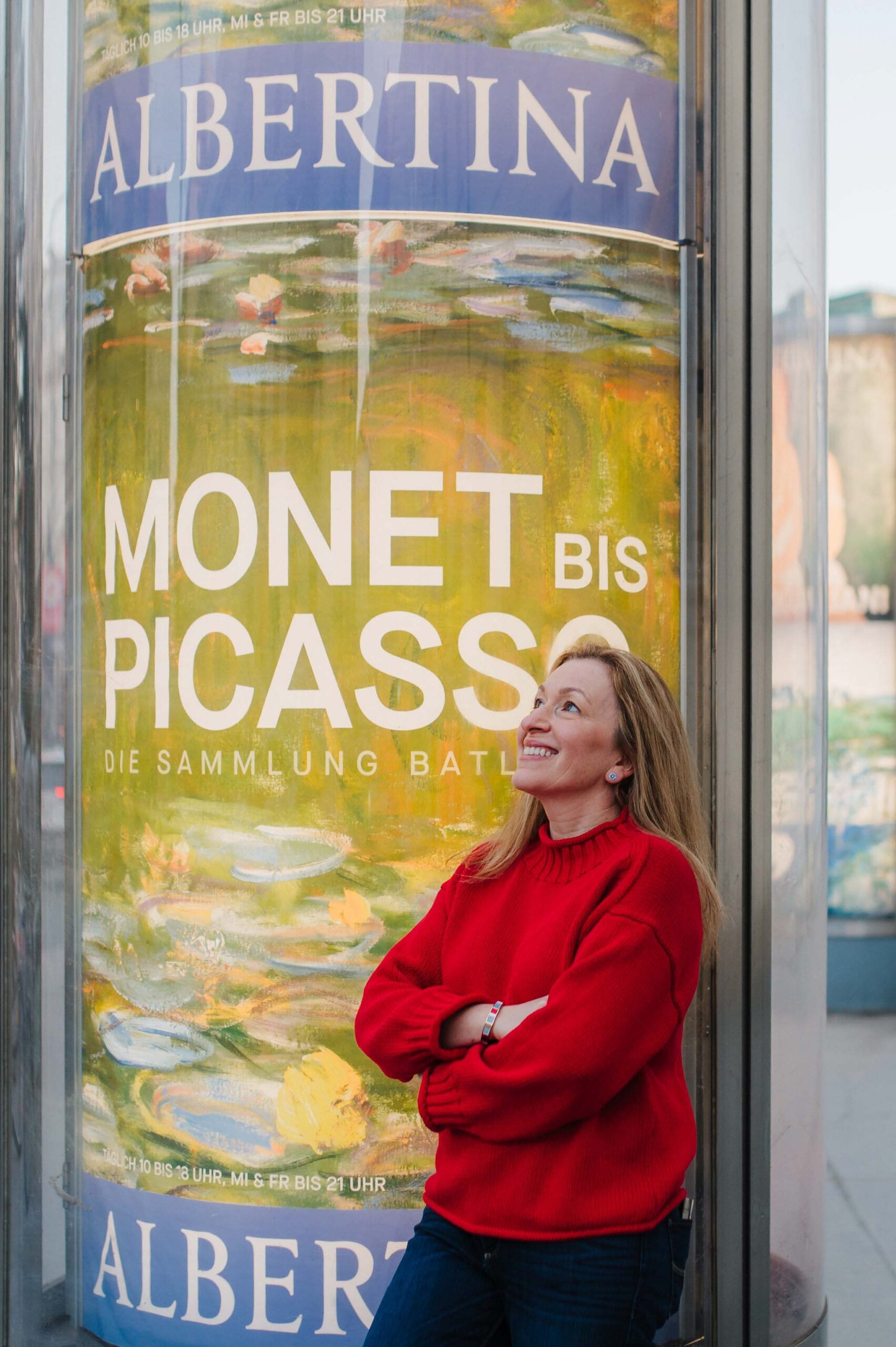 Woman posing outside Albertina Museum in Vienna city center